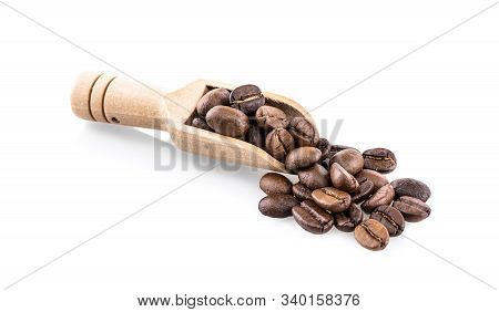 Fresh Coffee Beans In Wooden Spoon Ready For Rosted And Brew A Cup Of Coffee Isolated On White Backg