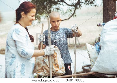 Mayapur, West Bengal, India - Dec 14, 2019. Volunteers Collecting Garbage In India. International Ec