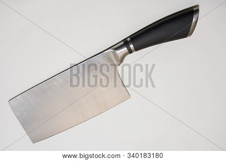 Large Sharp Cleaver Knife With Black Plactics Handles On White Background.