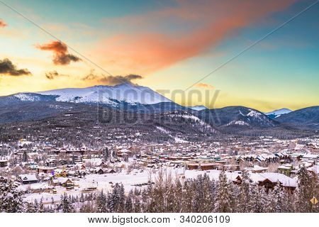 Breckenridge, Colorado, USA ski resort town skyline in winter at dawn.