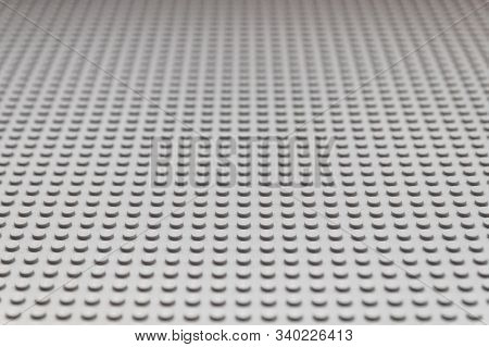 Kouvola, Finland - 18 December 2019: Long Run Perspective Of Lego Gray Baseplate