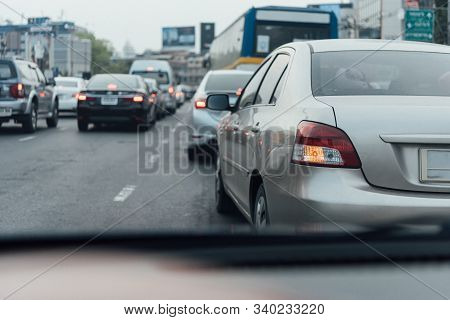Cars On Busy Road In The Bangkok City, Thailand. Many Cars Use The Street For Transportation In Rush