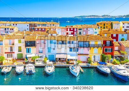 View Of Colorful Houses And Boats In Port Grimaud During Summer Day-port Grimaud, France