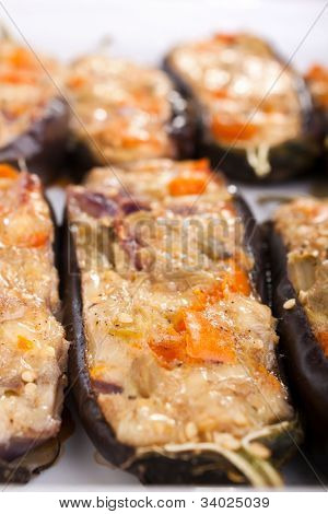 stuffed with cheese and mushrooms aubergines in a dish