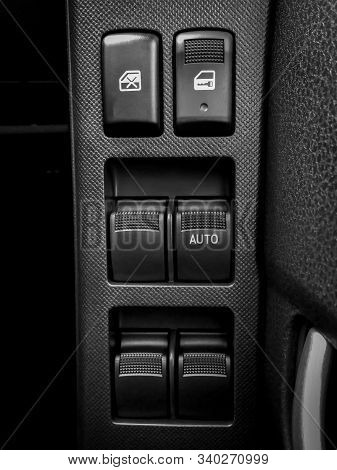 Central Lock, Door Glass Window Regulator Control Switch On Black And White Tone
