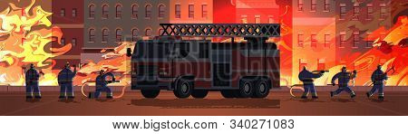 Firemen Near Fire Truck Getting Ready To Extinguishing Fire Firefighters In Uniform And Helmet Firef