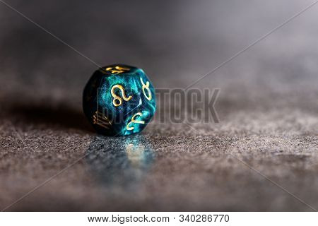 Astrology Dice With Zodiac Symbol Of Leo Jul 23 - Aug 22 On Dark Background