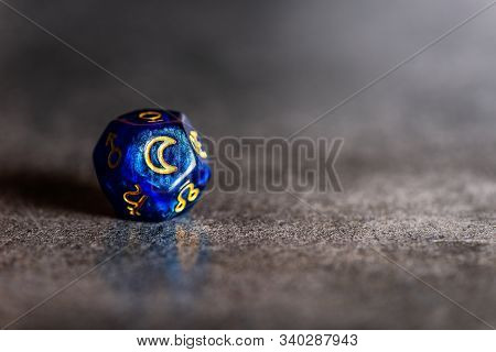 Blue Astrology Dice With Symbol Of The Moon On Grey Background