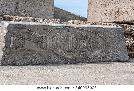Newcastle, Australia - December 10, 2009: Fisherman With Sloop In Bottle Artwork Edged On Defensive 