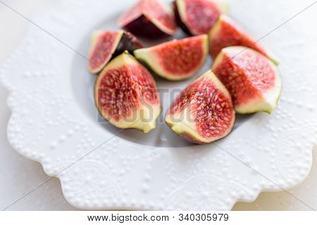 Chopped Figs On A White Ceramic Plate