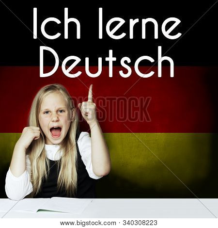 Thinking Child Girl Student Against The Germany Flag Background. Deutsch Concept With Inscription Le