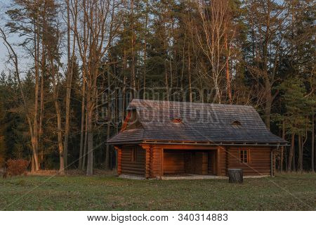 Sunset Near Trhove Sviny Town In South Bohemia In Winter Color Evening With Wooden Cottage