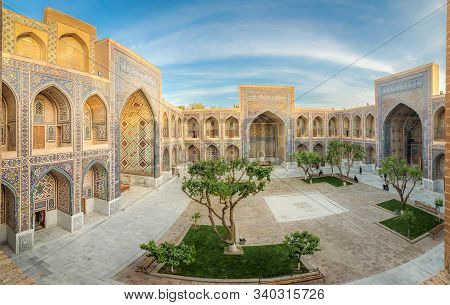 Samarkand, Uzbekistan - April 21 2019: Panoramic View Of Ulugh Beg Madrasah