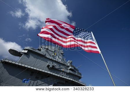 Charleston, South Carolina, United States, Novemner 2019, Us Flag The Stars And Stripes With The Uss