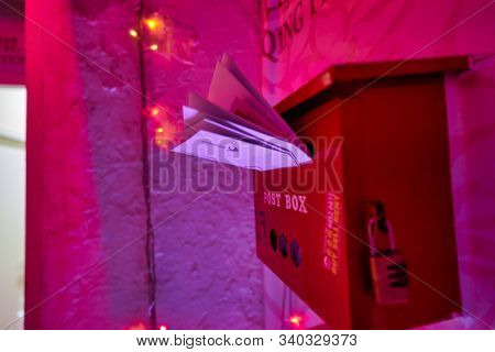 SINGAPORE - CIRCA APRIL, 2019: close up shot of letter box seen on a wall in Singapore.