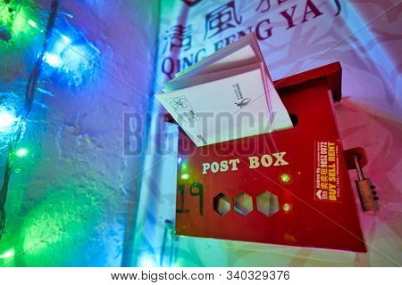 SINGAPORE - CIRCA APRIL, 2019: close up shot of letter box seen on a wall in Singapore.