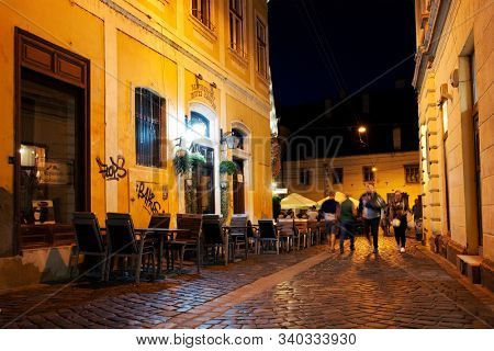 CLUJ NAPOCA, 26 SEPTEMBER 2019: A typical street view in the old center of Cluj Napoca, Romania                               