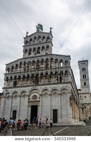 Lucca, Italy - June 6, 2019 : San Michele in Foro is a Roman Catholic basilica church, built over the ancient Roman forum. Until 1370 it was the seat of the Major Council, the commune s most important assembly. It is dedicated to Archangel Michael.