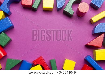 Kids Educational Developing Toys Frame On White Background. Top View. Flat Lay. Copy Space For Text