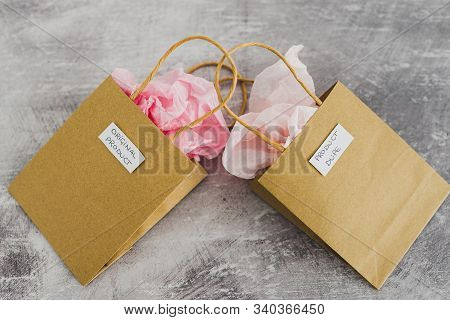 Original Product Vs Dupe Imitation, Shopping Bags With Labels Side By Side With Similar Paper Color