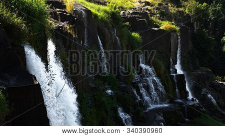 Amazing Pongour Waterfall In Vietnam, Da Lat With The Buddha On The Top.travel Concept ,wonderful Vi