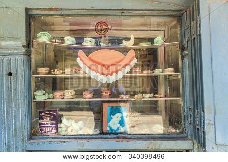 Kathmandu, Nepal - Mar 15, 2014: False Teeth Offered In A Dentists Shop In Kathmandu. The Used Teeth