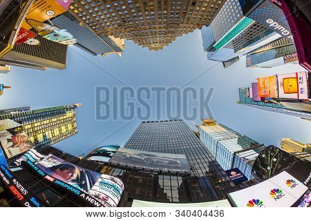 Neon Advertising Of News, Brands And Theaters At Times Square In Late Afternoon