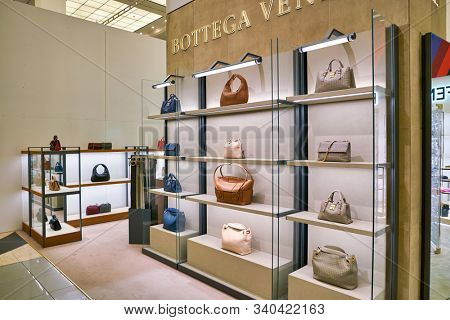 BERLIN, GERMANY - CIRCA SEPTEMBER, 2019: Bottega Veneta bags on display at the Kaufhaus des Westens (KaDeWe) department store in Berlin.