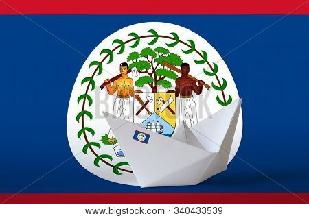 Belize Flag Depicted On Paper Origami Ship Closeup. Handmade Arts Concept