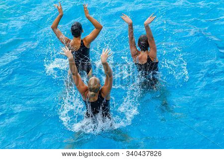 Synchronized Swimming Girls Overhead Action