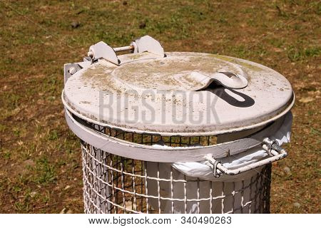 Trash Can And Recycling Bin In Park Natural Outdoor On Sunny Day. Garbage Recycle Can And Trash Bin 
