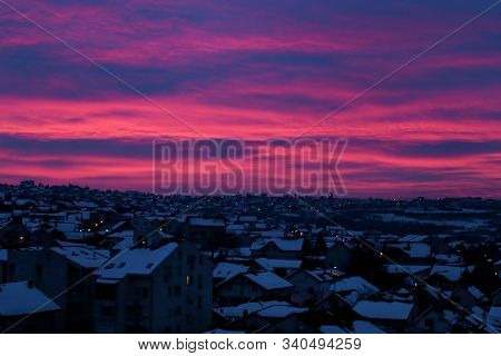 Beautiful Winter View Of Houses And Buildings With Roofs Covered With Heavy Snow. In Snowy Season, R