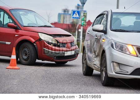 car crash accident on street. damaged automobiles