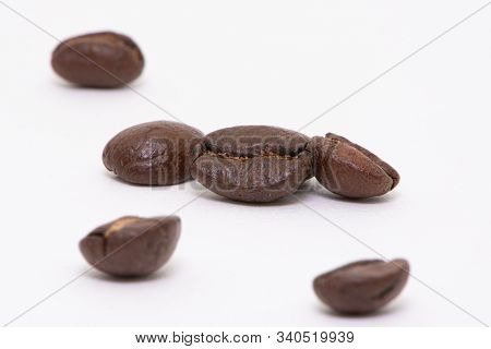 Close Up Of Coffee Beans On A White Background