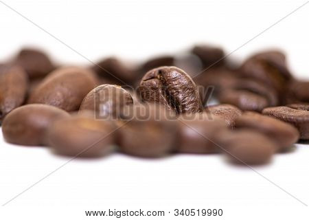 Close Up Of Coffee Beans On A White Background