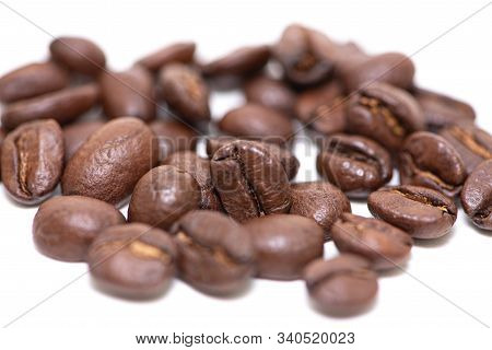 Close Up Of Coffee Beans On A White Background