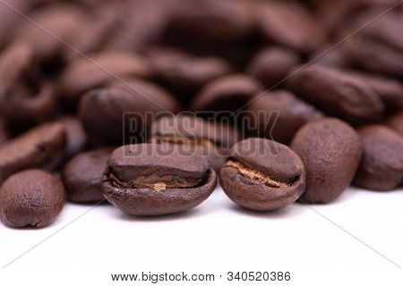 Close Up Of Coffee Beans On A White Background