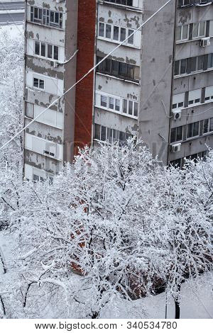 Beautiful Winter View Of Houses And Buildings With Roofs Covered With Heavy Snow. In Snowy Season, R
