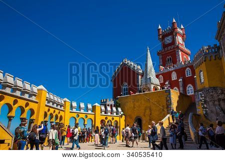 Sintra, Portugal - May, 2018: Tourists Visiting The Pena Palace A Romanticist Castle Located In Sao 