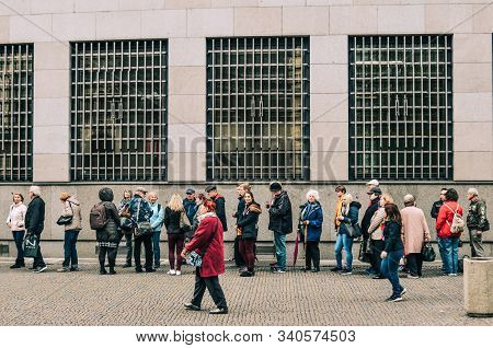 Prague, Czech - Oct 26, 2018. Many Citizens Queue Up In Bank On Pension Day. Many Bank Counters Are 