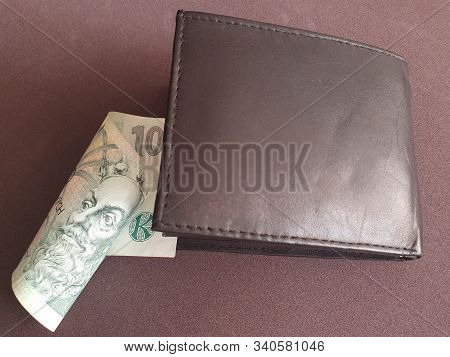 Black Leather Wallet And Czech Banknote Of 100 Korun