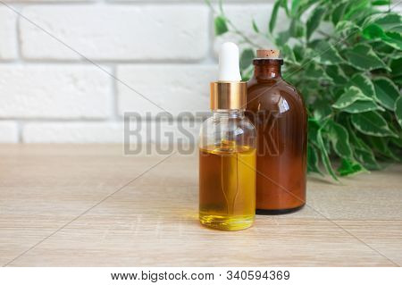 Glass Bottles With Oil Serum And Ubtan. Concept Natural Ogranic Skincare Cosmetic Products