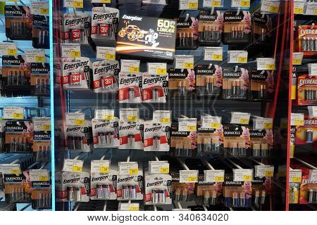 Energizer, Duracell, Eveready Aaa, Aa Batteries Displayed For Sale. Batteries Of Different Sizes In 
