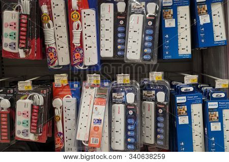 Selection Of Extension 3 Pin Plug Socket Wire On Supermarket. Many Adapter Power Plug Or Extension C