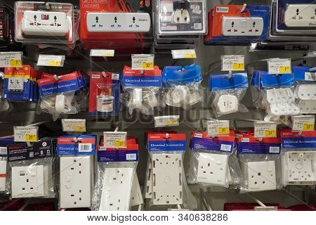 Selection Of Extension 3 Pin Plug Socket Wire On Supermarket. Many Adapter Power Plug Or Extension C