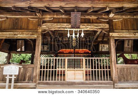 Miyajima, Japan - 15 September 2017: Omoto Shrine Entrance With Dark Carved Wood