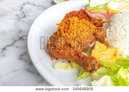 Ayam Penyet Is Indonesian East Javanese Cuisine - Consisting Of Fried Chicken That Is Smashed With T