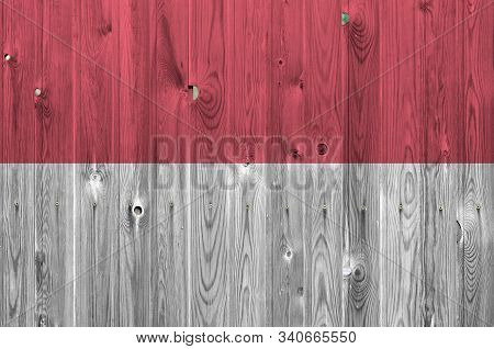 Indonesia Flag Depicted In Bright Paint Colors On Old Wooden Wall. Textured Banner On Rough Backgrou