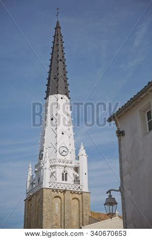 Church Of Ars With Black And White Bell Tower In The Ile De Re In Charente France