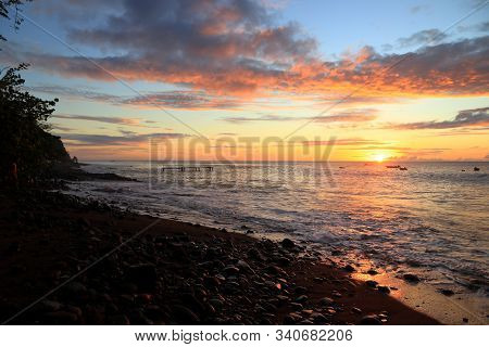 Guadeloupe Black Sand Beach. Caribbean Vacation Landscape. Sunset At Plage Caraibe Beach In Pointe N